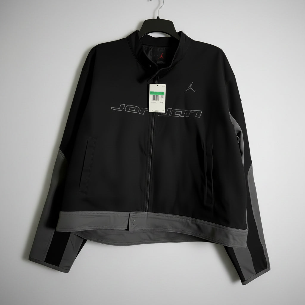 Black jacket with Jordan logo on a clean background